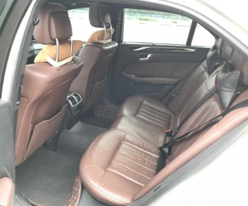 Mercedes-Benz E250 2015 - Mercedes E250 2015 màu trắng, nội thất nâu sang trọng, chủ xe bảo dưỡng định kỳ thường xuyên