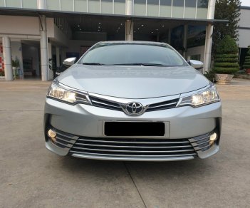 Toyota Corolla altis G 2018 - Cần bán xe Toyota Altis 1.8G AT 2018 màu bạc, xe đi ít giữ kĩ chính hãng Toyota Sure