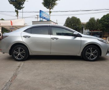 Toyota Corolla altis G 2018 - Cần bán xe Toyota Altis 1.8G AT 2018 màu bạc, xe đi ít giữ kĩ chính hãng Toyota Sure