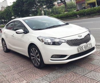 Kia K3   1.6 AT  2015 - Cần bán xe Kia K3 1.6 AT đời 2015, màu trắng ít sử dụng