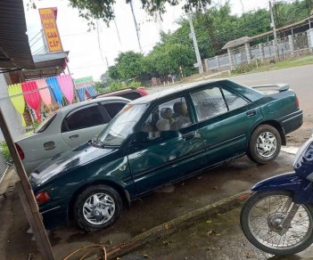 Mazda 323 1995 - Cần bán gấp Mazda 323 sản xuất 1995, xe nhập, màu xanh 