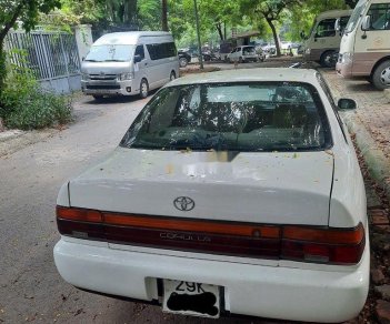 Toyota Corolla 1997 - Cần bán gấp Toyota Corolla sản xuất 1997, màu trắng, xe nhập, giá tốt