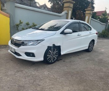 Honda City 2017 - Cần bán lại xe Honda City đời 2017, màu trắng còn mới  