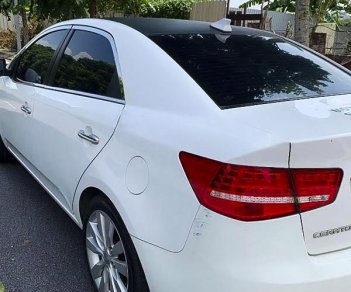 Kia Cerato   1.6AT  2010 - Bán xe Kia Cerato 1.6AT đời 2010, màu trắng, nhập khẩu nguyên chiếc số tự động giá cạnh tranh