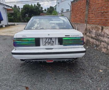 Nissan Bluebird 1986 - Bán xe Nissan Bluebird đời 1986, hai màu đen trắng, nhập khẩu giá cạnh tranh