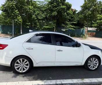 Kia Cerato   1.6AT  2010 - Bán xe Kia Cerato 1.6AT đời 2010, màu trắng, nhập khẩu nguyên chiếc số tự động giá cạnh tranh