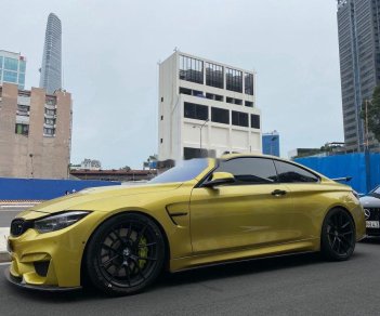 BMW M4   2017 - Bán ô tô BMW M4 đời 2017, màu vàng, xe nhập còn mới