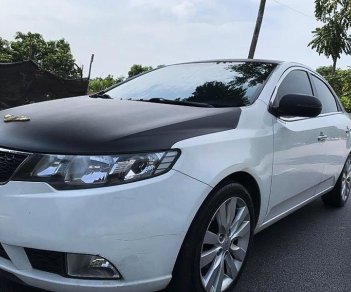 Kia Cerato   1.6AT  2010 - Bán xe Kia Cerato 1.6AT đời 2010, màu trắng, nhập khẩu nguyên chiếc số tự động giá cạnh tranh