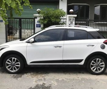 Hyundai i20 Active   1.4AT  2015 - Cần bán gấp Hyundai i20 Active 1.4AT đời 2015, màu trắng, nhập khẩu nguyên chiếc số tự động