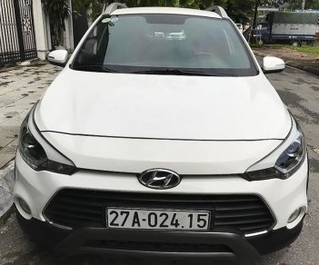 Hyundai i20 Active   1.4AT  2015 - Cần bán gấp Hyundai i20 Active 1.4AT đời 2015, màu trắng, nhập khẩu nguyên chiếc số tự động