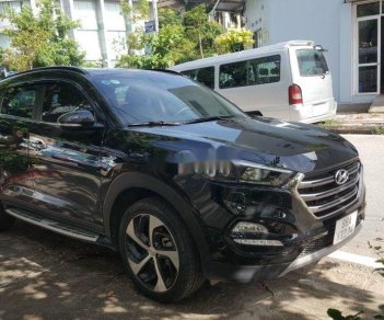 Hyundai Tucson     2019 - Cần bán gấp Hyundai Tucson sản xuất 2019, màu đen còn mới