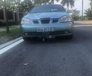 Daewoo Lacetti 2005 - Cần bán gấp Daewoo Lacetti 2005, màu bạc