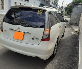 Mitsubishi Grandis 2.4 Mivec 2011 - Bán Mitsubishi Grandis 2.4 Mivec sản xuất năm 2011, màu trắng xe gia đình, 522tr