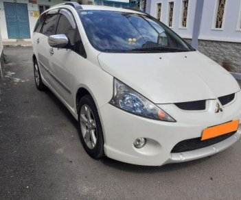 Mitsubishi Grandis 2.4 Mivec 2011 - Bán Mitsubishi Grandis 2.4 Mivec sản xuất năm 2011, màu trắng xe gia đình, 522tr