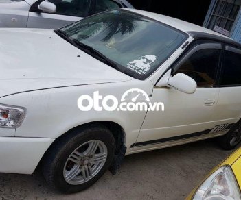 Toyota Corolla 1999 - Cần bán xe Toyota Corolla đời 1999, màu trắng, nhập khẩu nguyên chiếc giá cạnh tranh