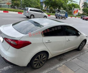 Kia K3   1.6 AT  2014 - Bán Kia K3 1.6 AT đời 2014, màu trắng, giá chỉ 445 triệu