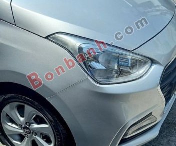 Hyundai Grand i10 2016 - Cần bán gấp Hyundai Grand i10 đời 2016, màu bạc xe gia đình