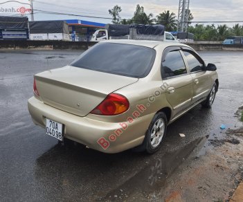 Kia Spectra   1.6 MT  2004 - Xe Kia Spectra 1.6 MT sản xuất năm 2004, màu vàng còn mới, 90 triệu