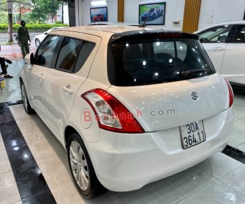 Suzuki Swift   1.4 AT  2014 - Cần bán xe Suzuki Swift 1.4 AT 2014, màu trắng chính chủ, giá chỉ 329 triệu