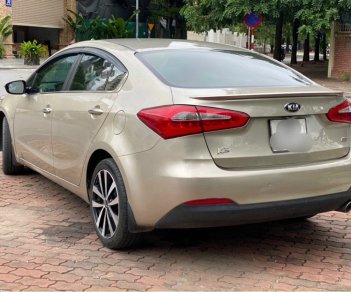 Kia K3   2.0 AT  2015 - Cần bán xe Kia K3 2.0 AT 2015, màu ghi vàng