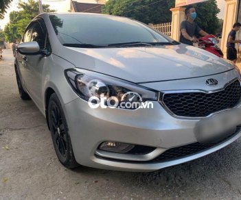 Kia K3 2015 - Cần bán gấp Kia K3 2015, màu ghi vàng