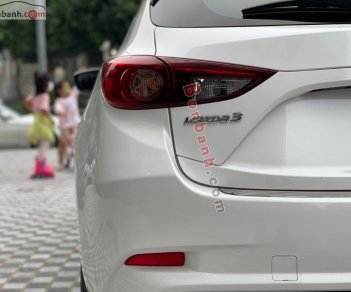 Mazda 3   1.5 AT 2018 - Cần bán lại xe Mazda 3 1.5 AT năm 2018, màu trắng, giá chỉ 599 triệu