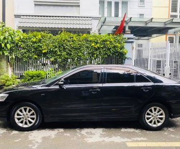 Toyota Camry   2.4 AT  2009 - Cần bán Toyota Camry 2.4 AT đời 2009, màu đen còn mới, giá 440tr