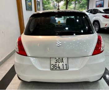 Suzuki Swift 2015 - Cần bán Suzuki Swift sản xuất 2015, màu trắng chính chủ, giá 330tr