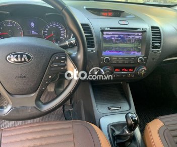 Kia K3 2015 - Cần bán gấp Kia K3 2015, màu ghi vàng