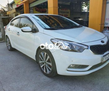 Kia K3 2014 - Cần bán lại xe Kia K3 đời 2014, màu trắng xe gia đình