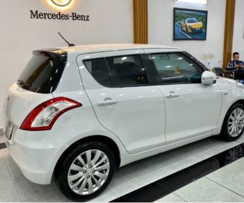 Suzuki Swift 2015 - Cần bán Suzuki Swift sản xuất 2015, màu trắng chính chủ, giá 330tr