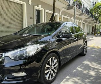 Kia K3   2.0 AT   2015 - Cần bán lại xe Kia K3 2.0 AT 2015, màu đen còn mới