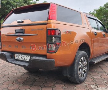 Ford Ranger   Wildtrak 3.2L 4x4 AT  2016 - Cần bán Ford Ranger Wildtrak 3.2L 4x4 AT năm 2016, màu vàng, nhập khẩu nguyên chiếc