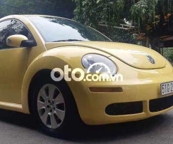 Volkswagen New Beetle   2007 - Cần bán xe Volkswagen New Beetle sản xuất 2007, màu vàng, nhập khẩu nguyên chiếc