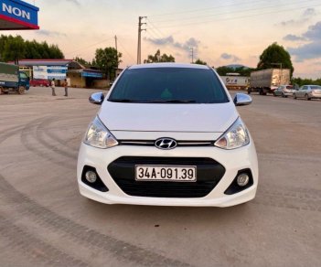 Hyundai Grand i10 2014 - Bán Hyundai Grand i10 năm sản xuất 2014, màu trắng, nhập khẩu nguyên chiếc còn mới, giá chỉ 305 triệu