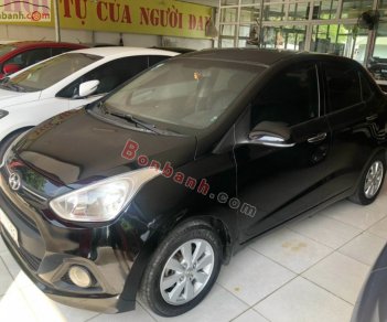 Hyundai Grand i10 2015 - Cần bán lại xe Hyundai Grand i10 2015, màu đen còn mới, 275tr