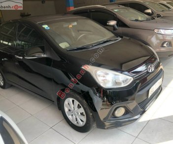 Hyundai Grand i10 2015 - Cần bán lại xe Hyundai Grand i10 2015, màu đen còn mới, 275tr