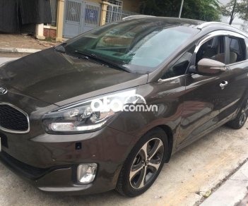 Kia Rondo 2015 - Bán Kia Rondo năm 2015, màu nâu, 495tr