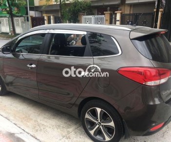 Kia Rondo 2015 - Bán Kia Rondo năm 2015, màu nâu, 495tr