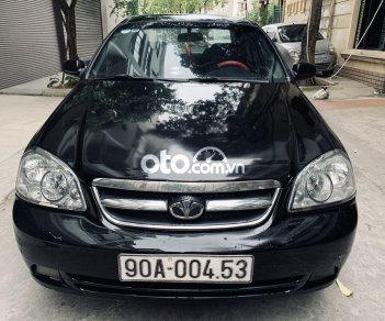 Daewoo Lacetti 2010 - Cần bán lại xe Daewoo Lacetti sản xuất năm 2010, màu đen, 165 triệu