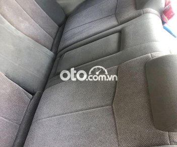 Mazda 323 2003 - Cần bán gấp Mazda 323 đời 2003, màu đen, nhập khẩu 