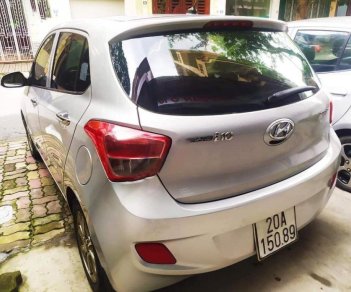 Hyundai Grand i10 2015 - Cần bán gấp Hyundai Grand i10 sản xuất năm 2015, màu bạc, nhập khẩu