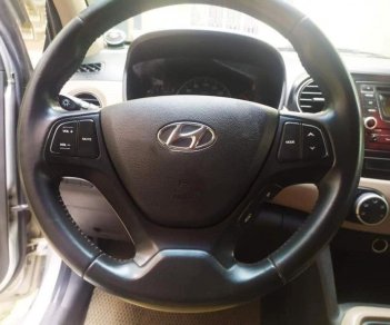 Hyundai Grand i10 2015 - Cần bán gấp Hyundai Grand i10 sản xuất năm 2015, màu bạc, nhập khẩu