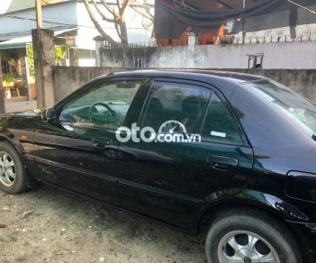 Mazda 323 2003 - Cần bán gấp Mazda 323 đời 2003, màu đen, nhập khẩu 