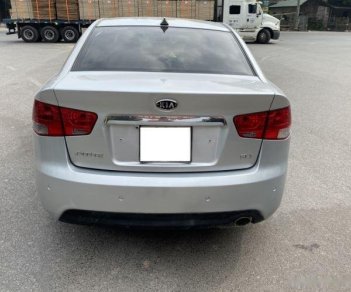 Kia Forte SLi 2009 - Cần bán xe Kia Forte SLi sản xuất 2009, màu bạc còn mới