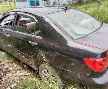 Toyota Corolla    2003 - Cần bán xe Toyota Corolla đời 2003, màu đen còn mới