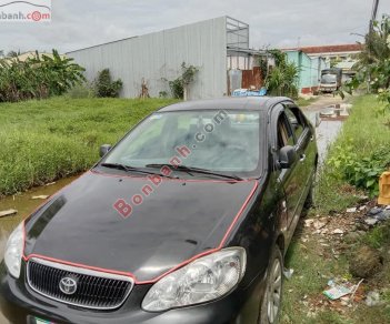 Toyota Corolla    2003 - Cần bán xe Toyota Corolla đời 2003, màu đen còn mới