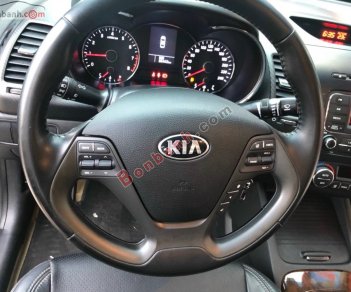 Kia K3    2014 - Xe Kia K3 sản xuất năm 2014, màu đen, nhập khẩu còn mới