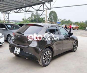 Mazda 2   1.5 AT 2016 - Cần bán Mazda 2 1.5 AT năm sản xuất 2016, màu nâu, 385 triệu