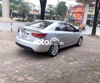 Kia Forte 2010 - Cần bán gấp Kia Forte năm sản xuất 2010, màu bạc số tự động